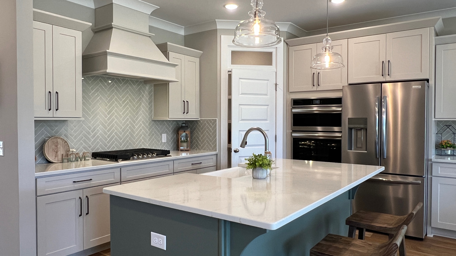 interior of bathroom with 2 vanities and a bathtub