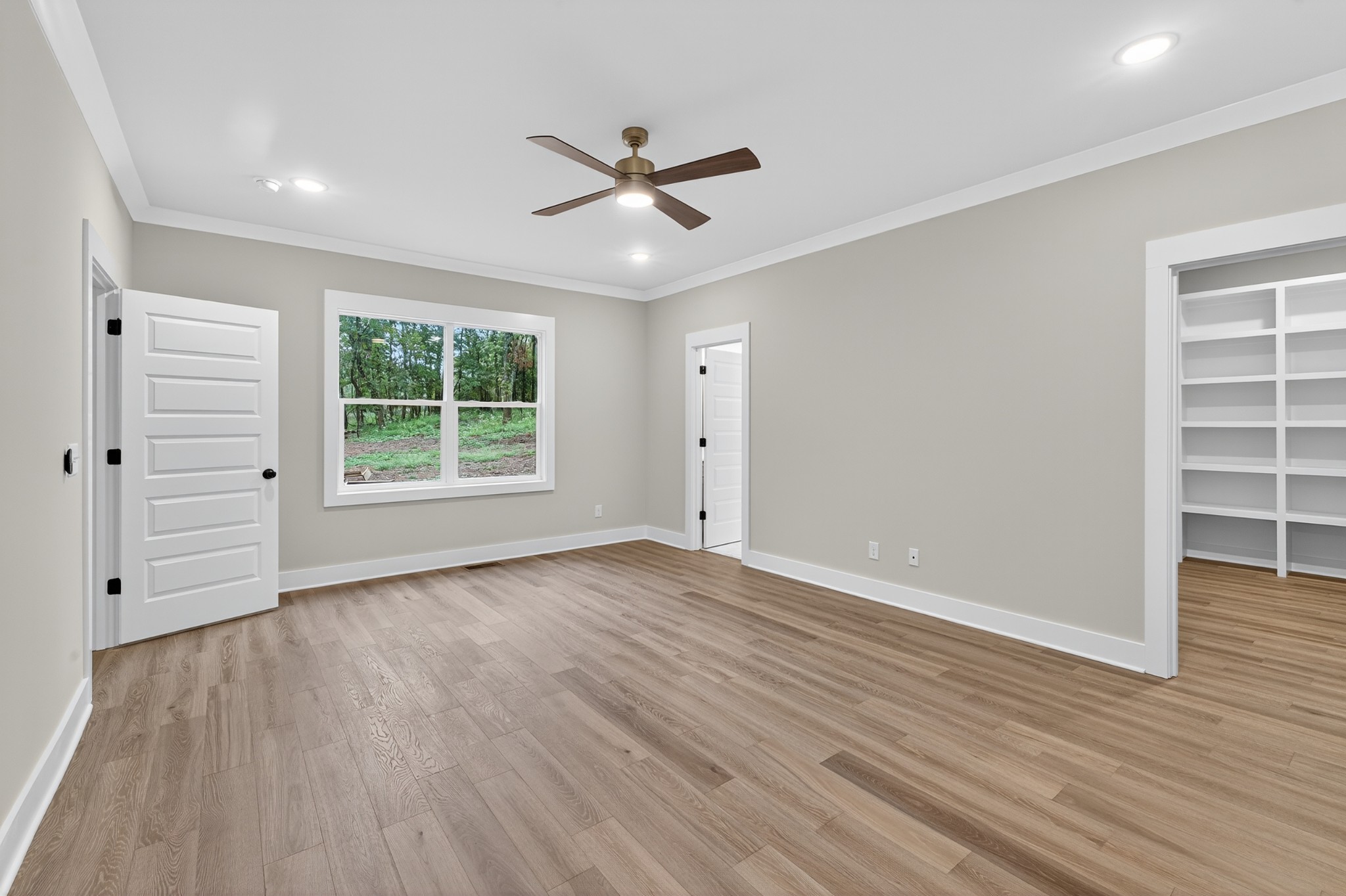 interior of bathroom with 2 vanities and a bathtub