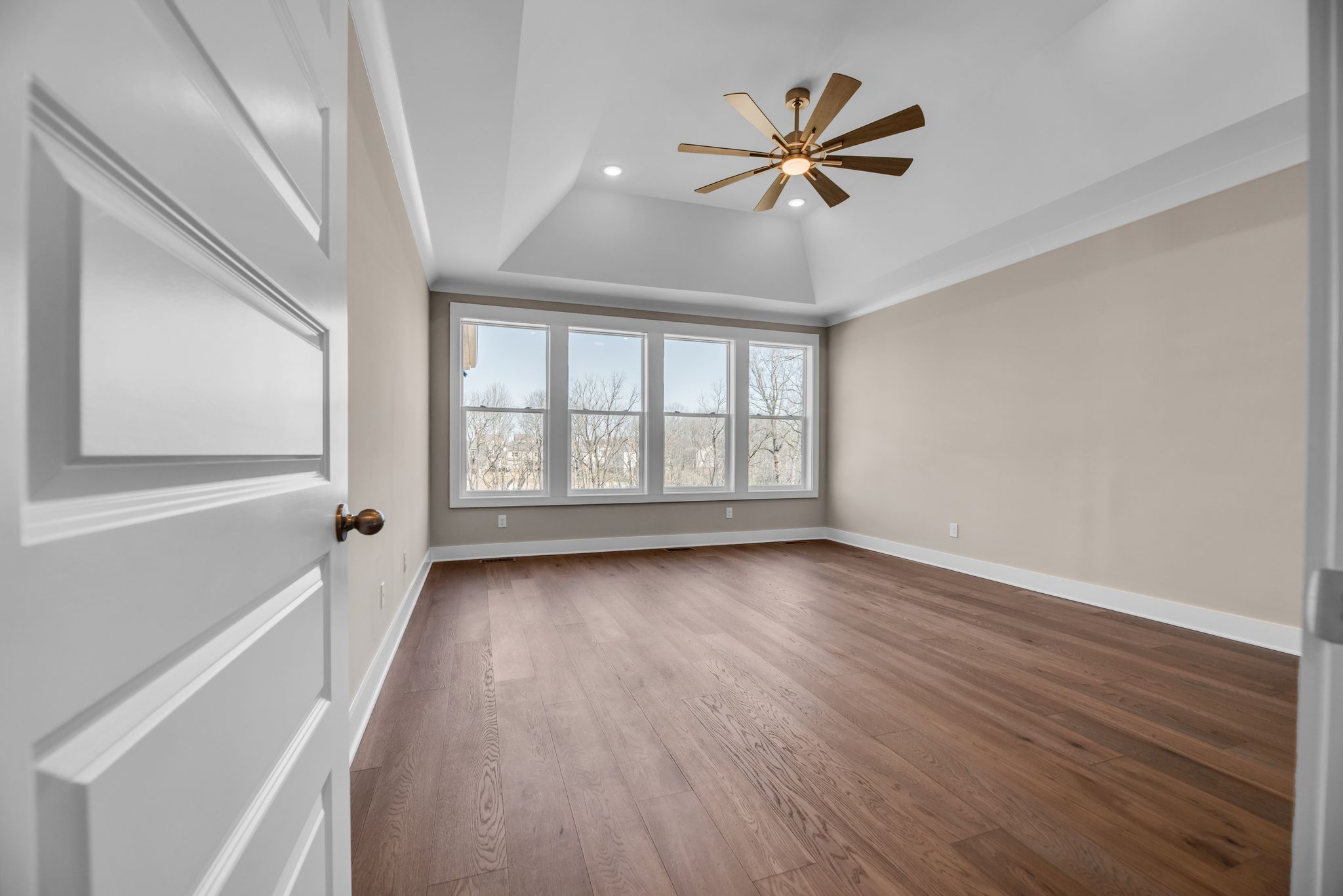 interior of bathroom with 2 vanities and a bathtub